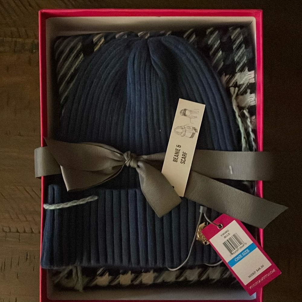 New with tags hat and scarf set to keep you warm.